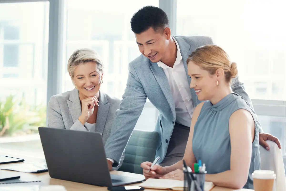 Business professionals consulting on LLC vs S-Corp decision comparing business entity structures for optimal tax and legal benefits.